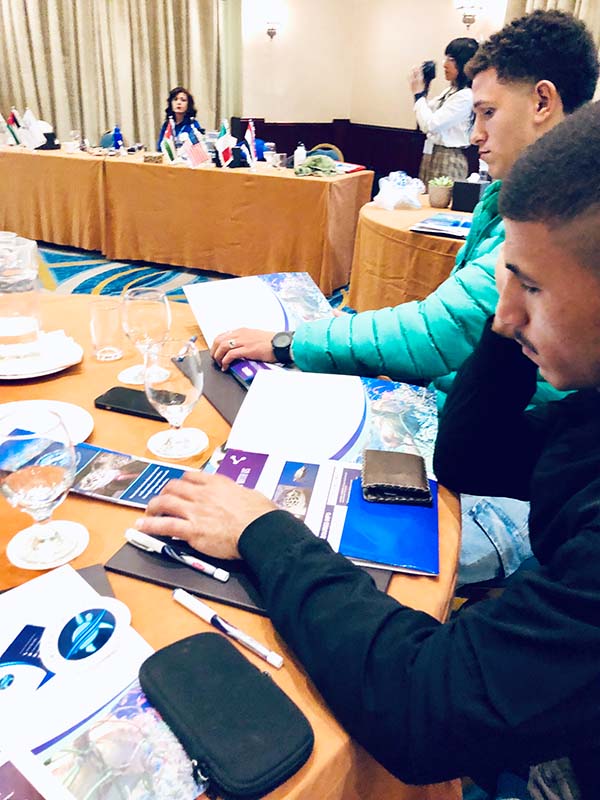 Workshop participants reviewing turtle ID materials and taking notes